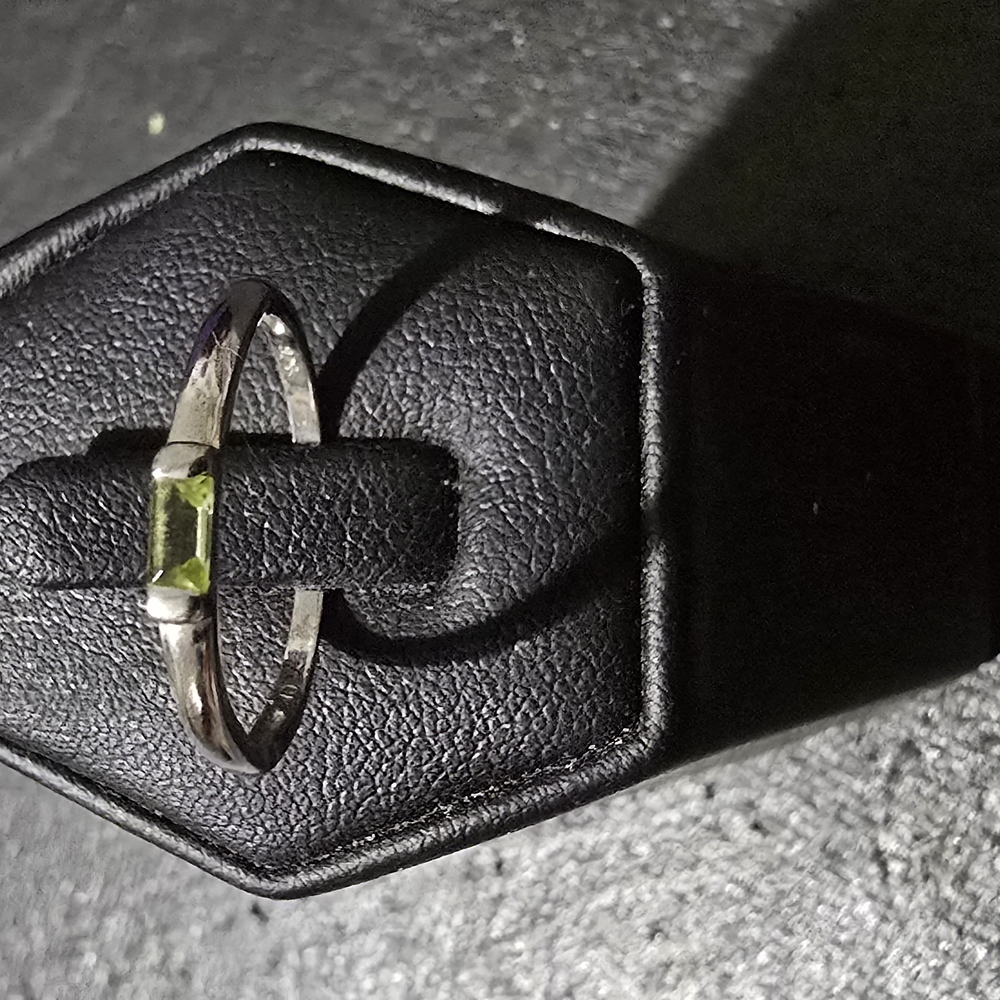 Elegant Silver Ring with Green Gemstone